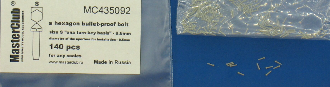 MC435092  противопульная головка болта, размер под ключ - 0.6mm;  диаметр отверстия для монтажа-0.5mm;   140 шт.